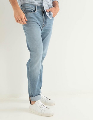 Jeans slim lavado claro para hombre